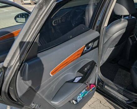 Черный Киа K7, объемом двигателя 2.2 л и пробегом 205 тыс. км за 19500 $, фото 5 на Automoto.ua