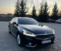 Черный Киа K7, объемом двигателя 2.2 л и пробегом 240 тыс. км за 18999 $, фото 1 на Automoto.ua