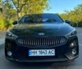 Черный Киа K7, объемом двигателя 3 л и пробегом 210 тыс. км за 14000 $, фото 1 на Automoto.ua