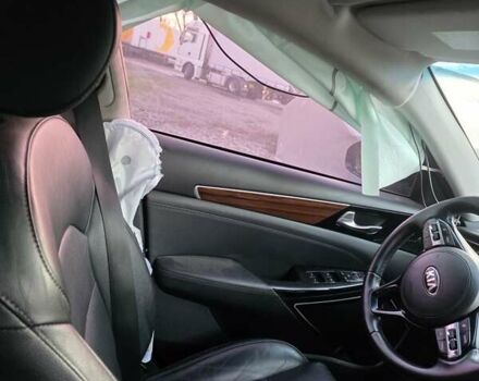 Черный Киа K7, объемом двигателя 3 л и пробегом 114 тыс. км за 9000 $, фото 1 на Automoto.ua