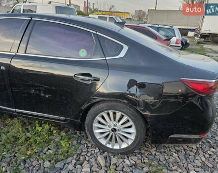 Черный Киа K7, объемом двигателя 3 л и пробегом 114 тыс. км за 9000 $, фото 4 на Automoto.ua