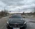 Черный Киа K7, объемом двигателя 2.2 л и пробегом 168 тыс. км за 25999 $, фото 1 на Automoto.ua