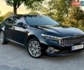Чорний Кіа K7, об'ємом двигуна 3 л та пробігом 90 тис. км за 25999 $, фото 1 на Automoto.ua