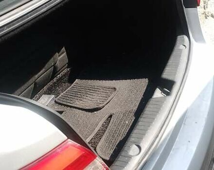 Серый Киа K7, объемом двигателя 3 л и пробегом 215 тыс. км за 7980 $, фото 1 на Automoto.ua