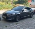 Серый Киа K7, объемом двигателя 3 л и пробегом 216 тыс. км за 8900 $, фото 1 на Automoto.ua