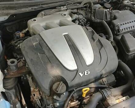 Серый Киа K7, объемом двигателя 3 л и пробегом 215 тыс. км за 7980 $, фото 11 на Automoto.ua