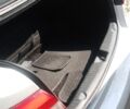 Серый Киа K7, объемом двигателя 3 л и пробегом 215 тыс. км за 8980 $, фото 1 на Automoto.ua