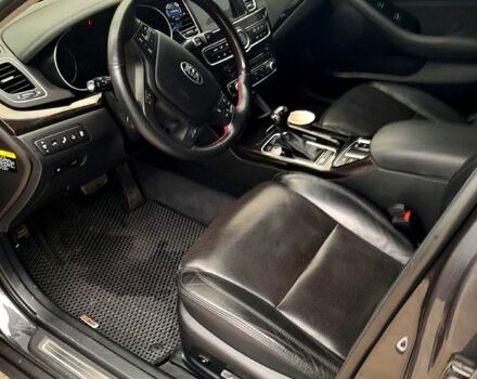 Серый Киа K7, объемом двигателя 3 л и пробегом 210 тыс. км за 10000 $, фото 3 на Automoto.ua