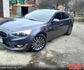 Серый Киа K7, объемом двигателя 3 л и пробегом 210 тыс. км за 10000 $, фото 2 на Automoto.ua