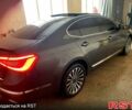 Серый Киа K7, объемом двигателя 3 л и пробегом 210 тыс. км за 10000 $, фото 1 на Automoto.ua