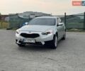Серый Киа K7, объемом двигателя 3 л и пробегом 257 тыс. км за 5799 $, фото 1 на Automoto.ua