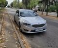 Серый Киа K7, объемом двигателя 3 л и пробегом 300 тыс. км за 11000 $, фото 1 на Automoto.ua
