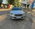 Серый Киа K7, объемом двигателя 3 л и пробегом 300 тыс. км за 11000 $, фото 2 на Automoto.ua