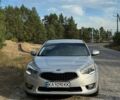 Серый Киа K7, объемом двигателя 3 л и пробегом 424 тыс. км за 10500 $, фото 1 на Automoto.ua