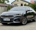 Серый Киа K7, объемом двигателя 3 л и пробегом 210 тыс. км за 13900 $, фото 1 на Automoto.ua