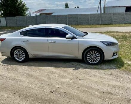 Серый Киа K7, объемом двигателя 3 л и пробегом 299 тыс. км за 13500 $, фото 2 на Automoto.ua