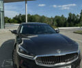 Серый Киа K7, объемом двигателя 3 л и пробегом 185 тыс. км за 13000 $, фото 1 на Automoto.ua