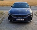 Серый Киа K7, объемом двигателя 3 л и пробегом 270 тыс. км за 14500 $, фото 1 на Automoto.ua