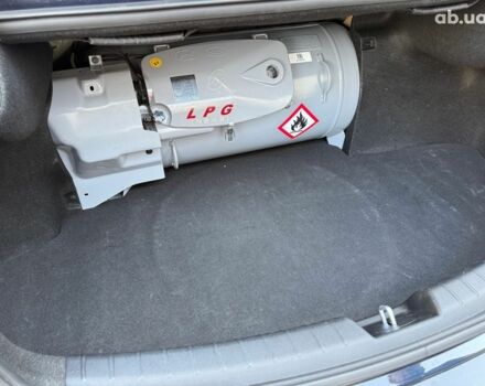 Синій Кіа K7, об'ємом двигуна 3 л та пробігом 195 тис. км за 18490 $, фото 40 на Automoto.ua