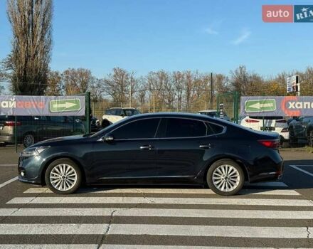 Синий Киа K7, объемом двигателя 3 л и пробегом 210 тыс. км за 16200 $, фото 4 на Automoto.ua