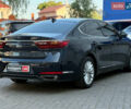 Синий Киа K7, объемом двигателя 3 л и пробегом 195 тыс. км за 17290 $, фото 5 на Automoto.ua