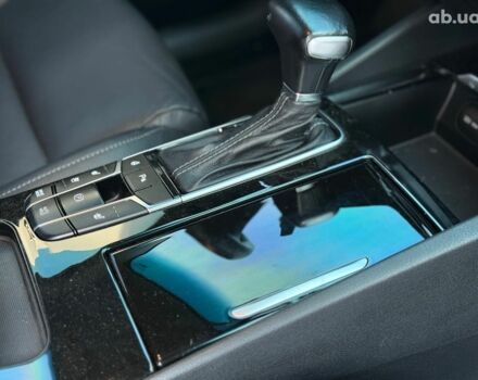 Синій Кіа K7, об'ємом двигуна 3 л та пробігом 195 тис. км за 18490 $, фото 22 на Automoto.ua