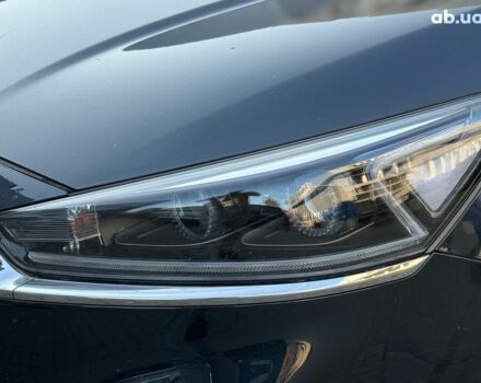 Синій Кіа K7, об'ємом двигуна 3 л та пробігом 195 тис. км за 18490 $, фото 4 на Automoto.ua