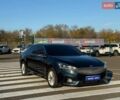 Синий Киа K7, объемом двигателя 3 л и пробегом 210 тыс. км за 16200 $, фото 2 на Automoto.ua