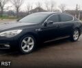 Черный Киа K900, объемом двигателя 3.3 л и пробегом 172 тыс. км за 17000 $, фото 1 на Automoto.ua