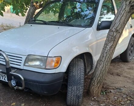 Белый Киа Sportage, объемом двигателя 2 л и пробегом 316 тыс. км за 4000 $, фото 2 на Automoto.ua