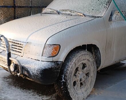 Белый Киа Sportage, объемом двигателя 2 л и пробегом 316 тыс. км за 4000 $, фото 1 на Automoto.ua