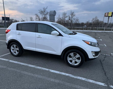 Білий Кіа Sportage, об'ємом двигуна 2.4 л та пробігом 265 тис. км за 10599 $, фото 5 на Automoto.ua