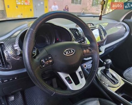 Білий Кіа Sportage, об'ємом двигуна 2 л та пробігом 125 тис. км за 14800 $, фото 9 на Automoto.ua