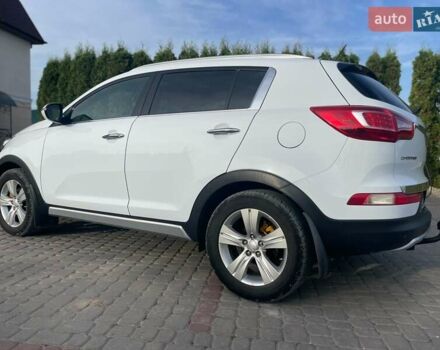 Білий Кіа Sportage, об'ємом двигуна 2 л та пробігом 215 тис. км за 13800 $, фото 6 на Automoto.ua