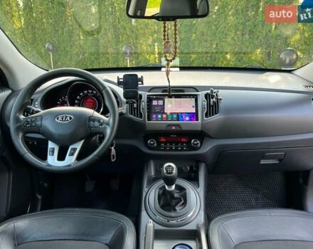 Білий Кіа Sportage, об'ємом двигуна 2 л та пробігом 215 тис. км за 13800 $, фото 14 на Automoto.ua