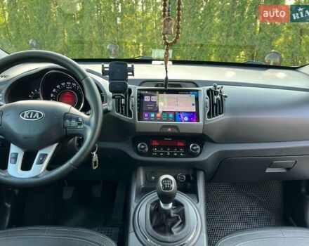 Білий Кіа Sportage, об'ємом двигуна 2 л та пробігом 215 тис. км за 13800 $, фото 15 на Automoto.ua