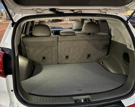 Білий Кіа Sportage, об'ємом двигуна 2.4 л та пробігом 265 тис. км за 10599 $, фото 21 на Automoto.ua