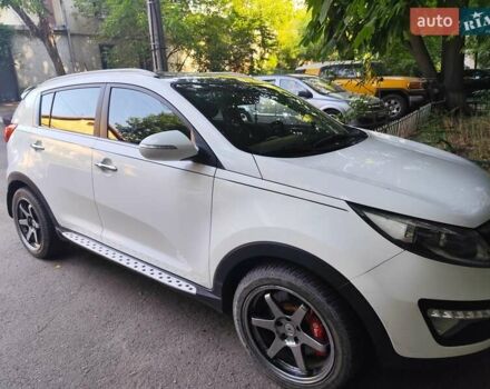 Білий Кіа Sportage, об'ємом двигуна 2 л та пробігом 125 тис. км за 14800 $, фото 3 на Automoto.ua