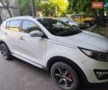 Білий Кіа Sportage, об'ємом двигуна 2 л та пробігом 125 тис. км за 14800 $, фото 3 на Automoto.ua