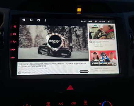 Білий Кіа Sportage, об'ємом двигуна 2.4 л та пробігом 265 тис. км за 10599 $, фото 41 на Automoto.ua