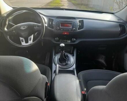 Белый Киа Sportage, объемом двигателя 2 л и пробегом 220 тыс. км за 10800 $, фото 2 на Automoto.ua