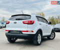 Белый Киа Sportage, объемом двигателя 2 л и пробегом 225 тыс. км за 12400 $, фото 1 на Automoto.ua