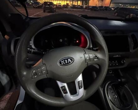 Білий Кіа Sportage, об'ємом двигуна 2.4 л та пробігом 265 тис. км за 10599 $, фото 25 на Automoto.ua