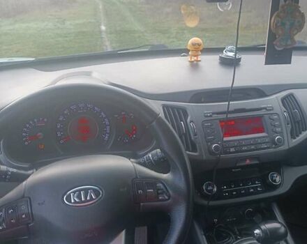 Білий Кіа Sportage, об'ємом двигуна 2 л та пробігом 173 тис. км за 11000 $, фото 4 на Automoto.ua
