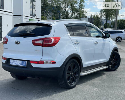 Білий Кіа Sportage, об'ємом двигуна 2 л та пробігом 191 тис. км за 16490 $, фото 4 на Automoto.ua