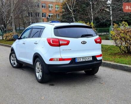 Білий Кіа Sportage, об'ємом двигуна 2 л та пробігом 102 тис. км за 14700 $, фото 6 на Automoto.ua