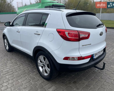 Білий Кіа Sportage, об'ємом двигуна 2 л та пробігом 234 тис. км за 13950 $, фото 6 на Automoto.ua
