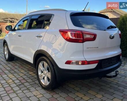 Білий Кіа Sportage, об'ємом двигуна 2 л та пробігом 223 тис. км за 14950 $, фото 7 на Automoto.ua