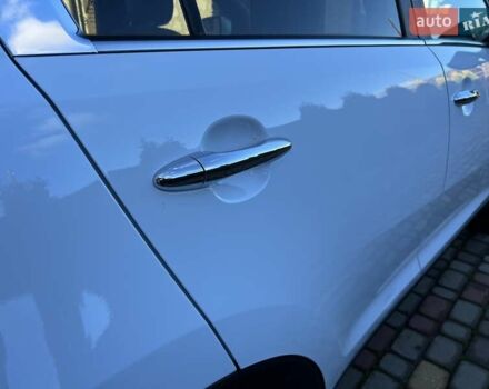 Білий Кіа Sportage, об'ємом двигуна 2 л та пробігом 223 тис. км за 14950 $, фото 24 на Automoto.ua