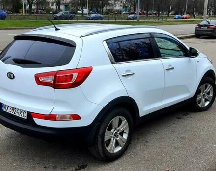 Білий Кіа Sportage, об'ємом двигуна 2 л та пробігом 102 тис. км за 14700 $, фото 14 на Automoto.ua